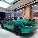 installation of emerald green car wrap