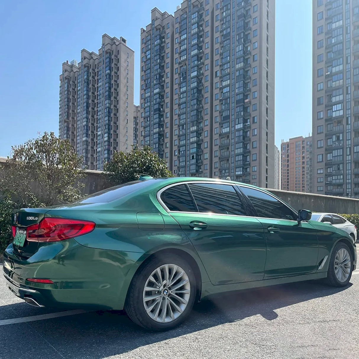 sedan wrapped in emerald green vehicle wrap