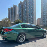 sedan wrapped in emerald green vehicle wrap