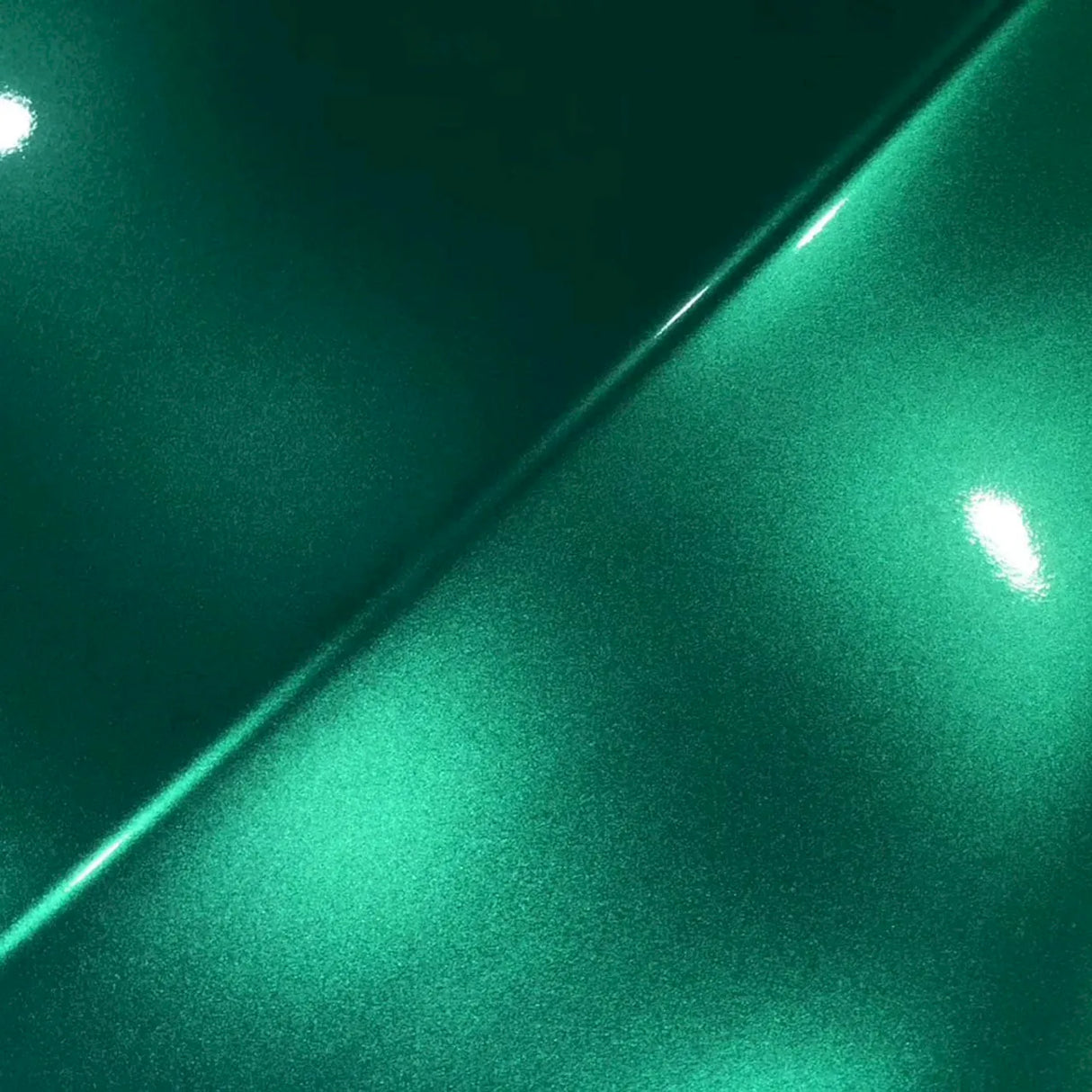 close up shot of emerald green car wrap