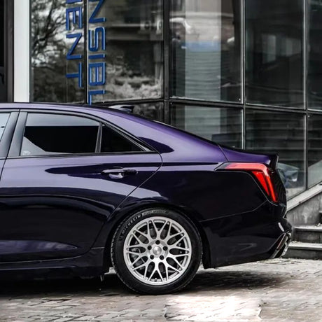 ghost midnight purple wrap on the back quarter panel of a car