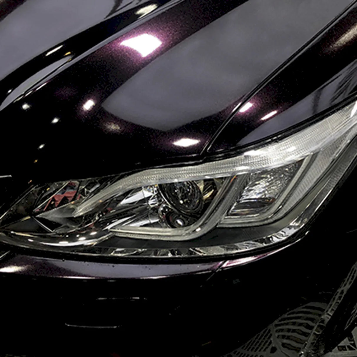 midnight red car wrap in the darker setting