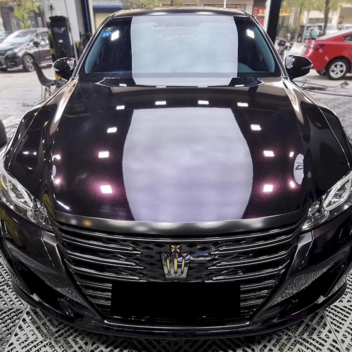 car wrapped in midnight red vinyl wrap