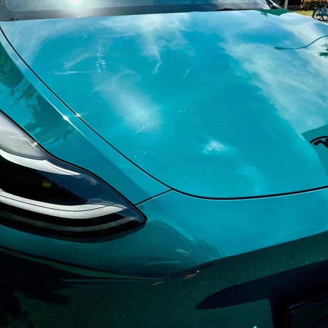 gloss hell green car wrap on a vehicle in the sun