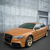 sports car wrapped in gloss caramel brown car wrap