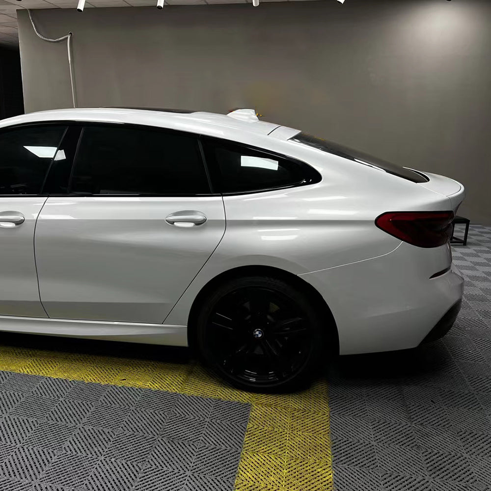 bmw wrapped in gloss crescent white car wrap