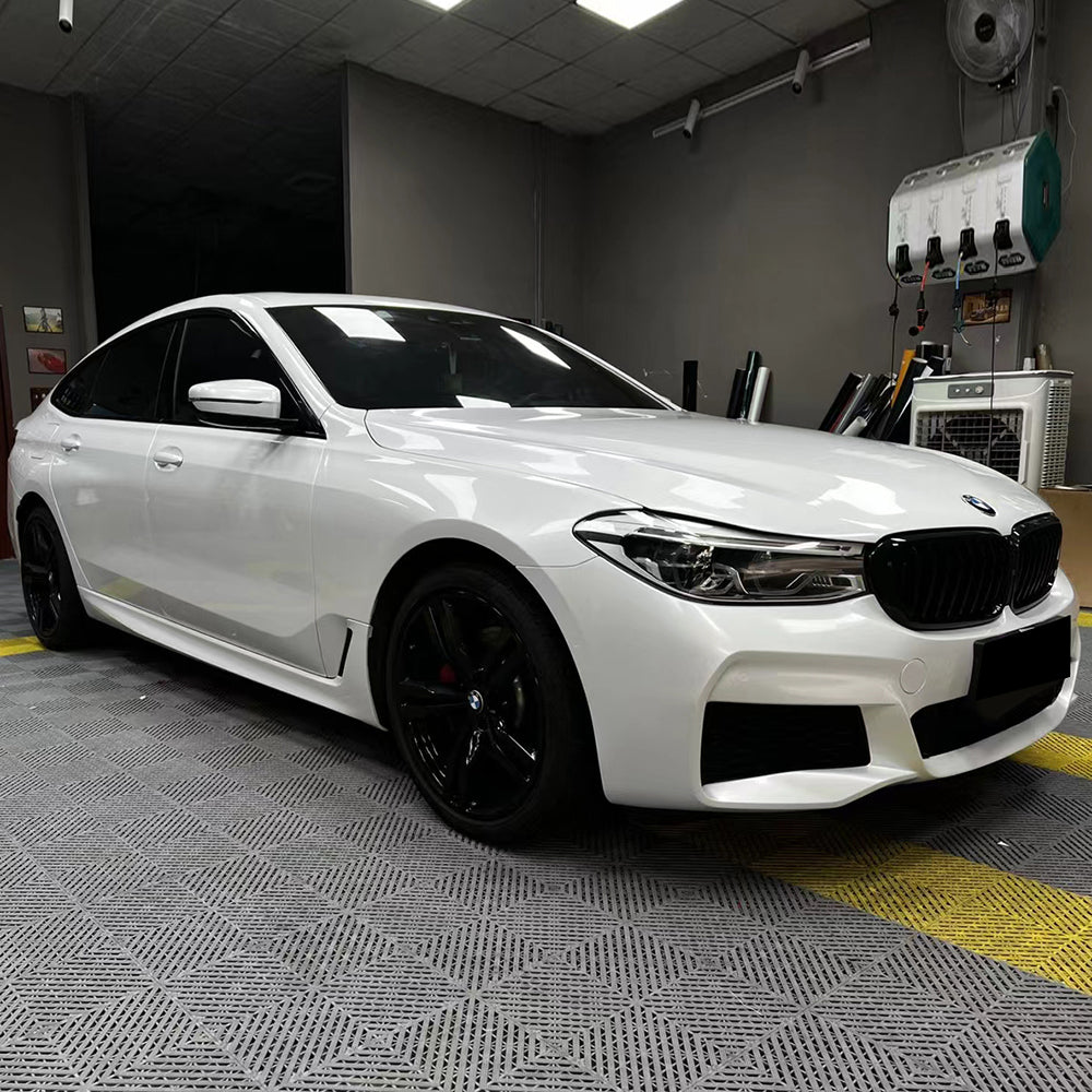 car wrapped in gloss crescent white car wrap
