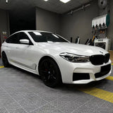 car wrapped in gloss crescent white car wrap