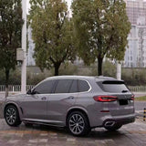 vehicle wrapped in gloss dark nado gray car wrap