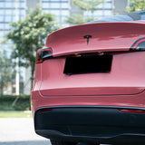 gloss dark plum sauce car wrap on a car