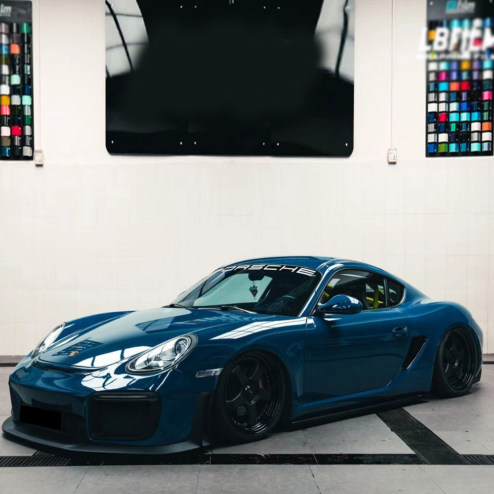 car wrapped in gloss deep blue vinyl car wrap