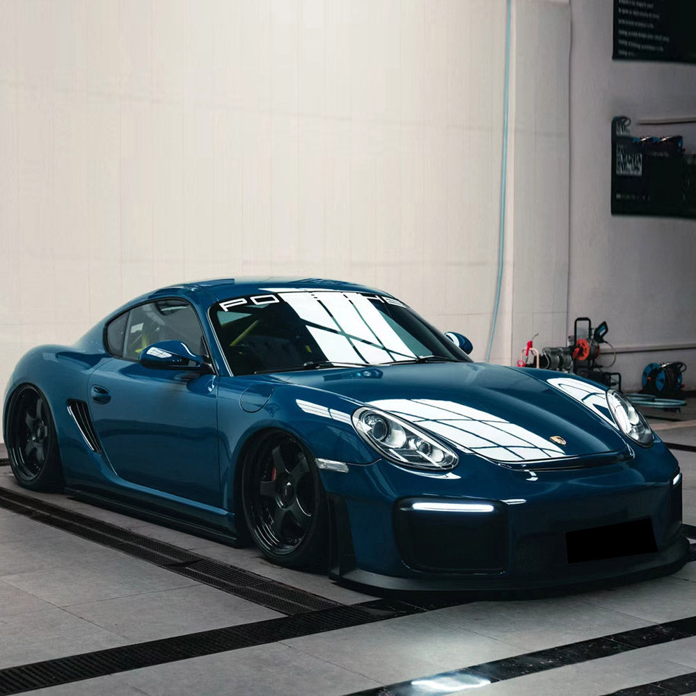 sports car wrapped in gloss deep blue car wrap