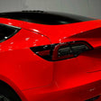 car wrapped in gloss italian supercar red color car wrap