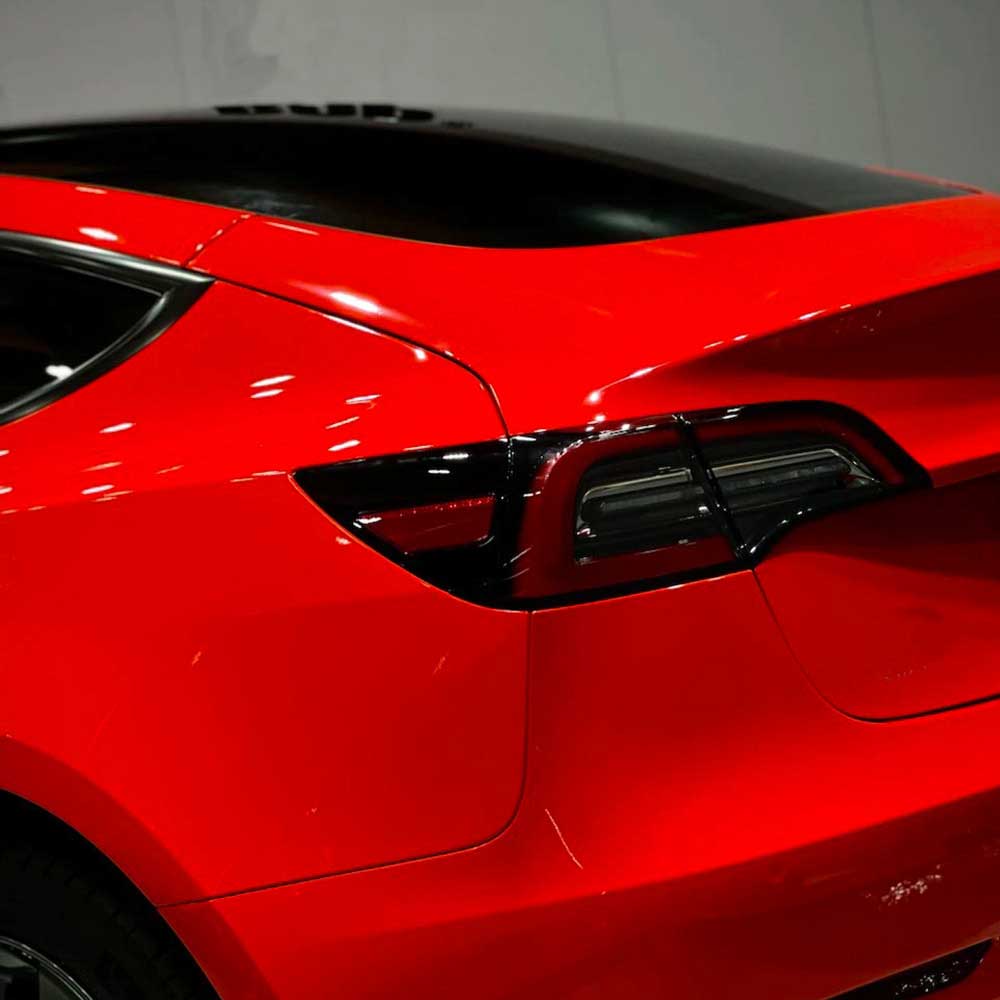 car wrapped in gloss italian supercar red color car wrap