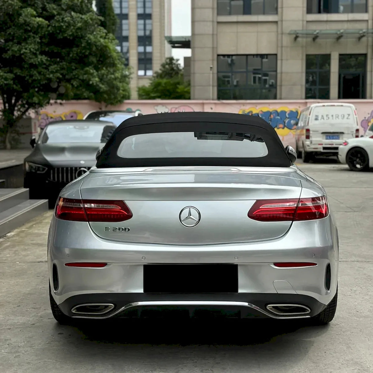 gloss silver car wrap installed on a convertible