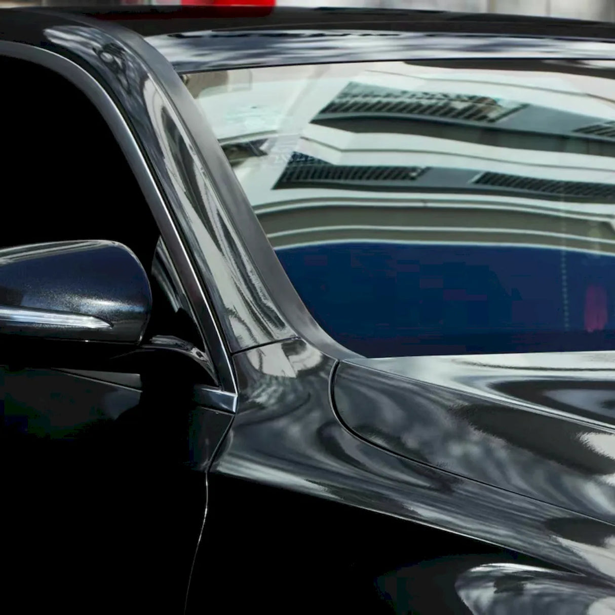 vehicle wrapped in gloss metallic black car wrap