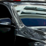 vehicle wrapped in gloss metallic black car wrap