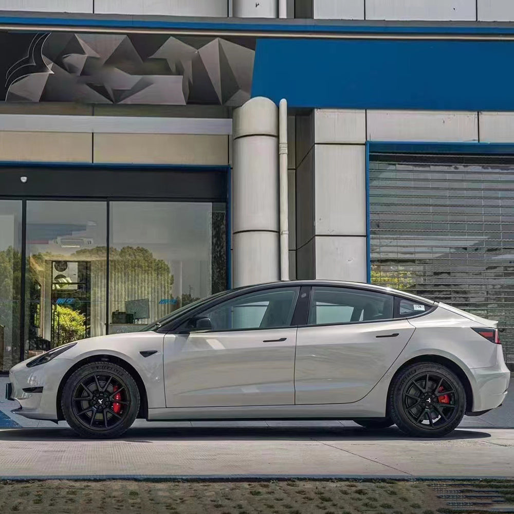 side shot of gloss metallic gray car wrap
