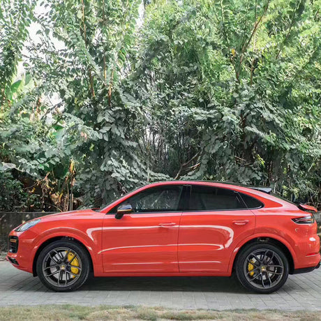 side profile of gloss redish orange car wrap