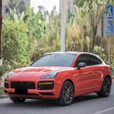 suv wrapped in gloss redish orange car wrap