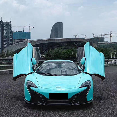 gloss sea breeze blue car wrap on a sports car