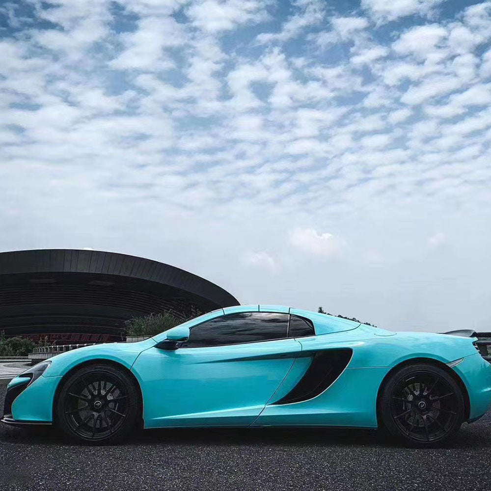 gloss sea breeze blue car wrap on a supercar