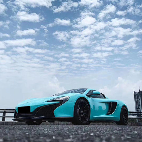 car wrapped in gloss sea breeze blue car wrap