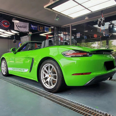 sports car wrapped in gloss viper green car wrap