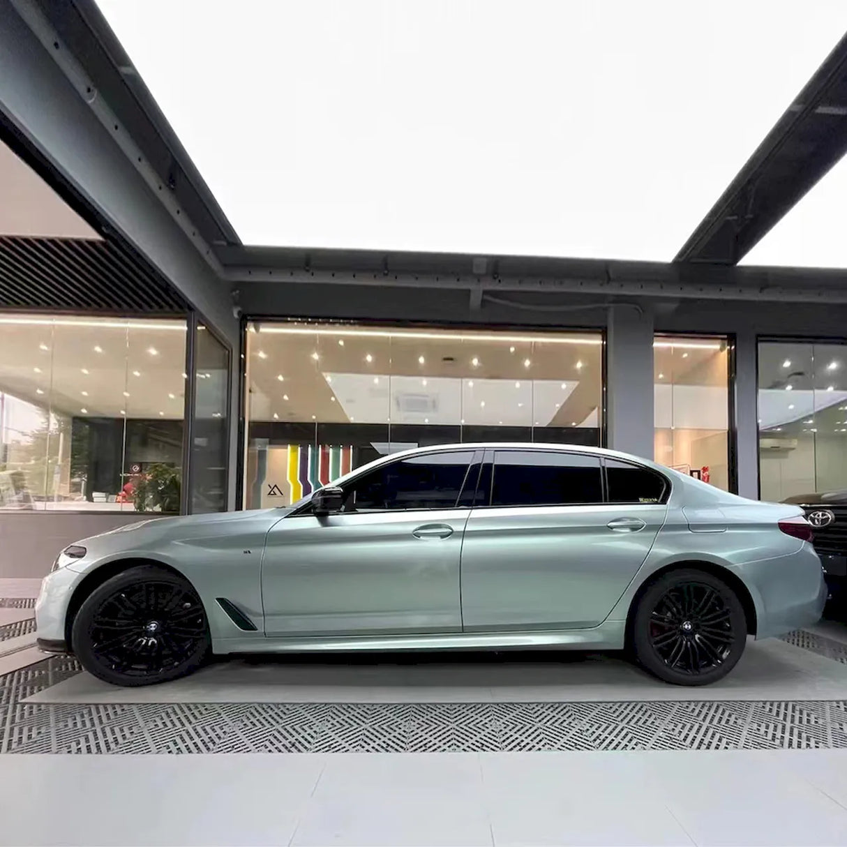 car wrapped in highland metallic silver green car wrap