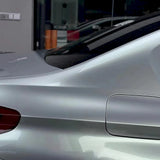 up close shot of a car wrapped in highland metallic green silver car wrap