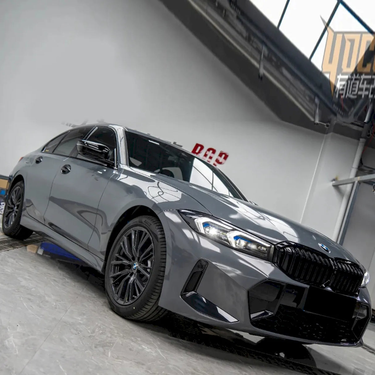 jasper gray gloss car wrap on a bmw