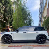 side shot of a vehicle wrapped in martin silver gray car wrap on a sunny day