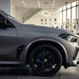 matte amg grey car wrap on the front of a vehicle