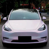matte diamond pollen pink car wrap installed on a car