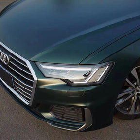 matte emerald green car wrap slight reflection during the dawn