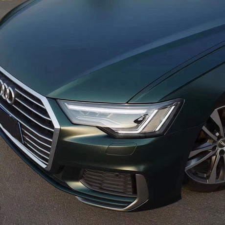 matte emerald green car wrap slight reflection during the dawn