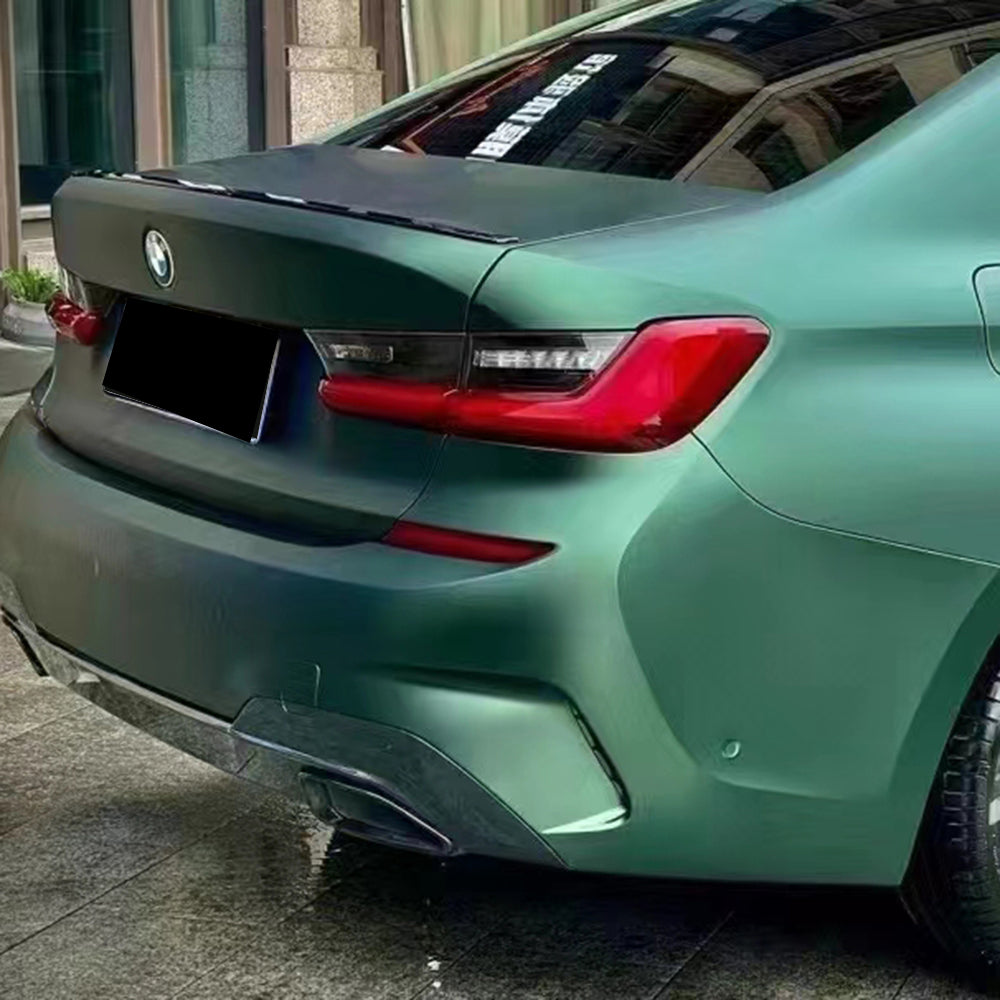 matte emerald green car wrap on the rear of a vehicle