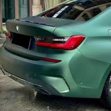 matte emerald green car wrap on the rear of a vehicle