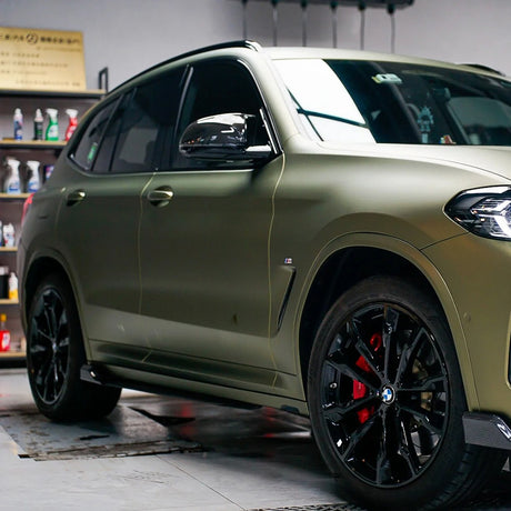 side shot of matte lightning green brown car wrap