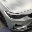 matte ultimate flat silver car wrap on the front of a vehicle