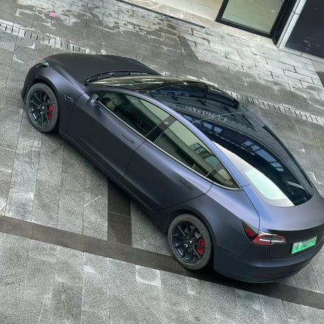 car wrapped in matte black blue car wrap