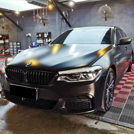 matte black car wrap installation