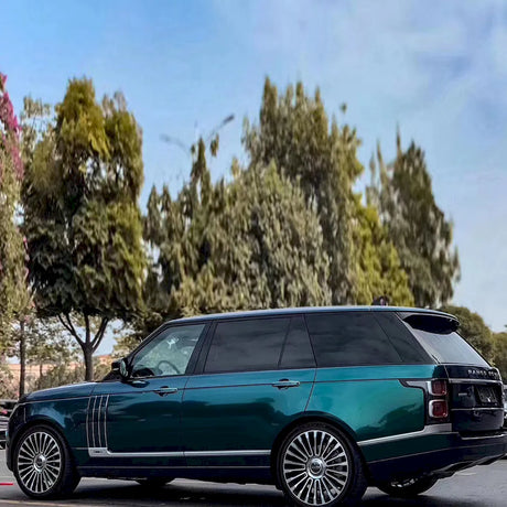 suv wrapped in a metallic agate green gloss car wrap