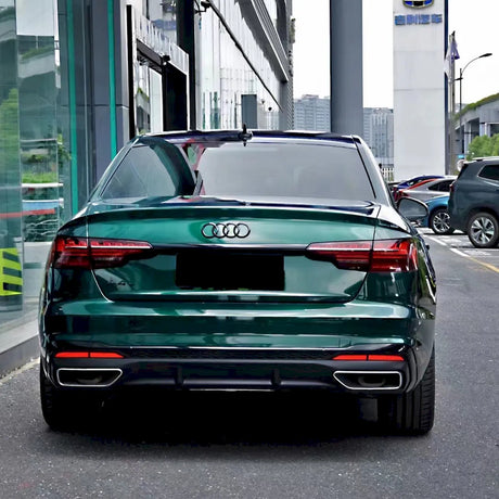 luxury sedan wrapped in metallic agate green car wrap
