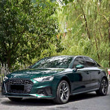 small sedan wrapped in metallic agate green car wrap