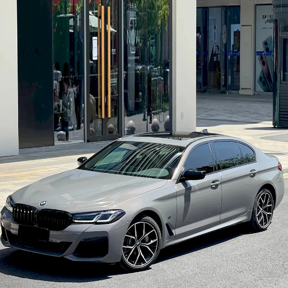 metallic bernina gray car vinyl wrap in the sun