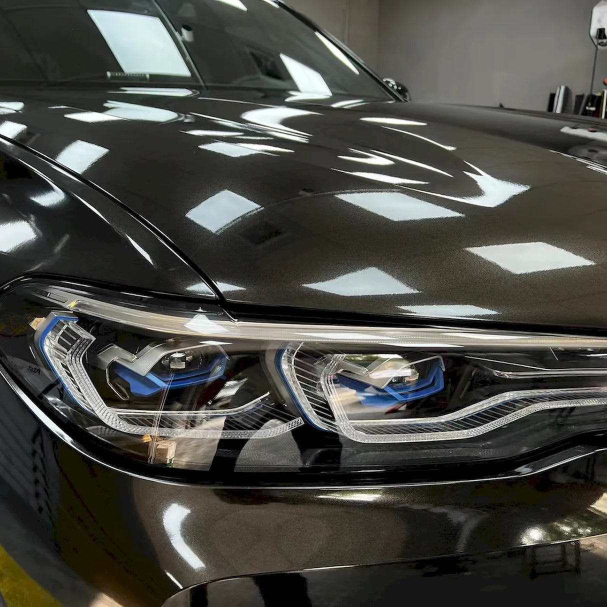 metallic black gold car wrap on a suv