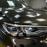 metallic black gold car wrap on a suv