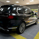 car wrapped in metallic black gold car wrap