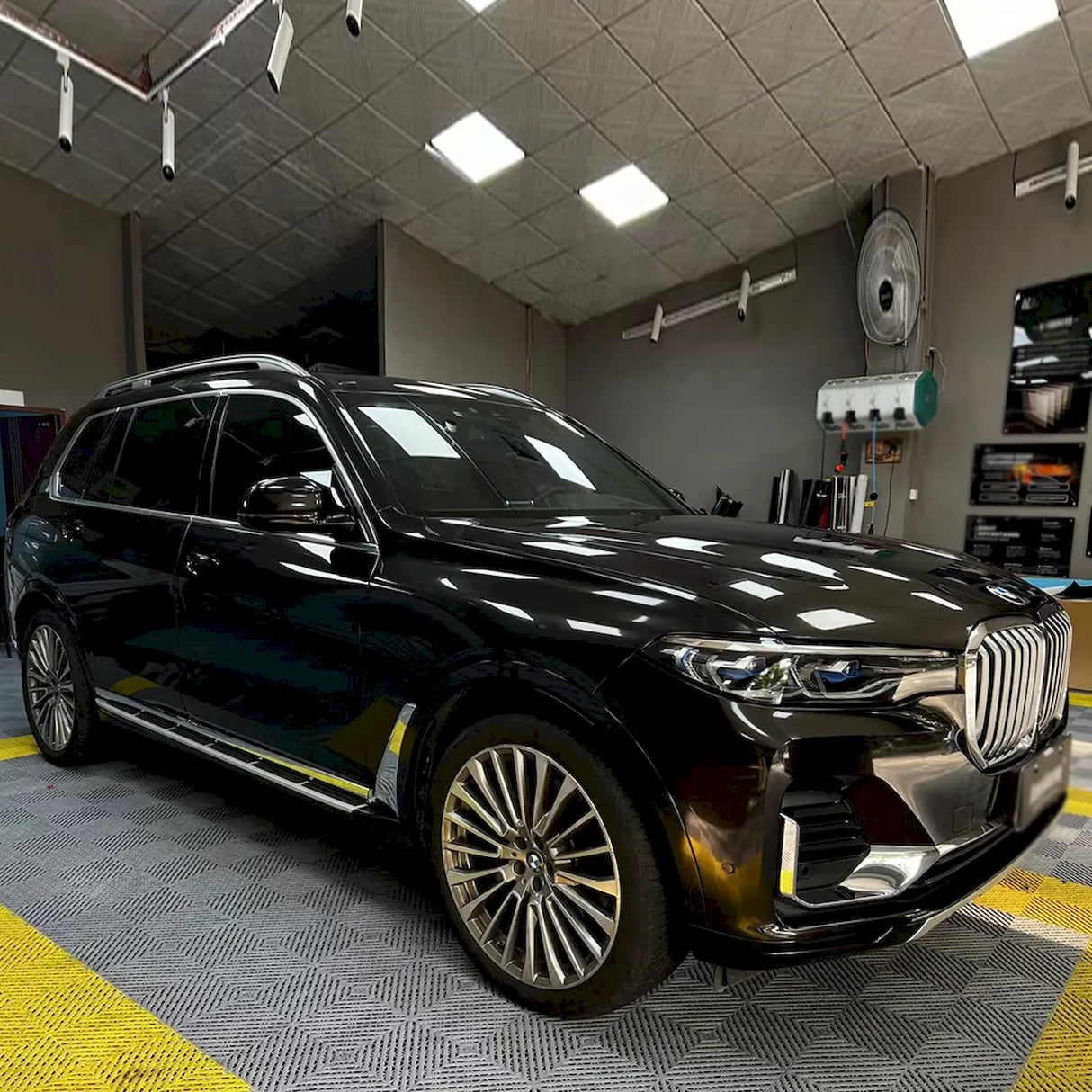 car being wrapped in metallic black gold car wrap
